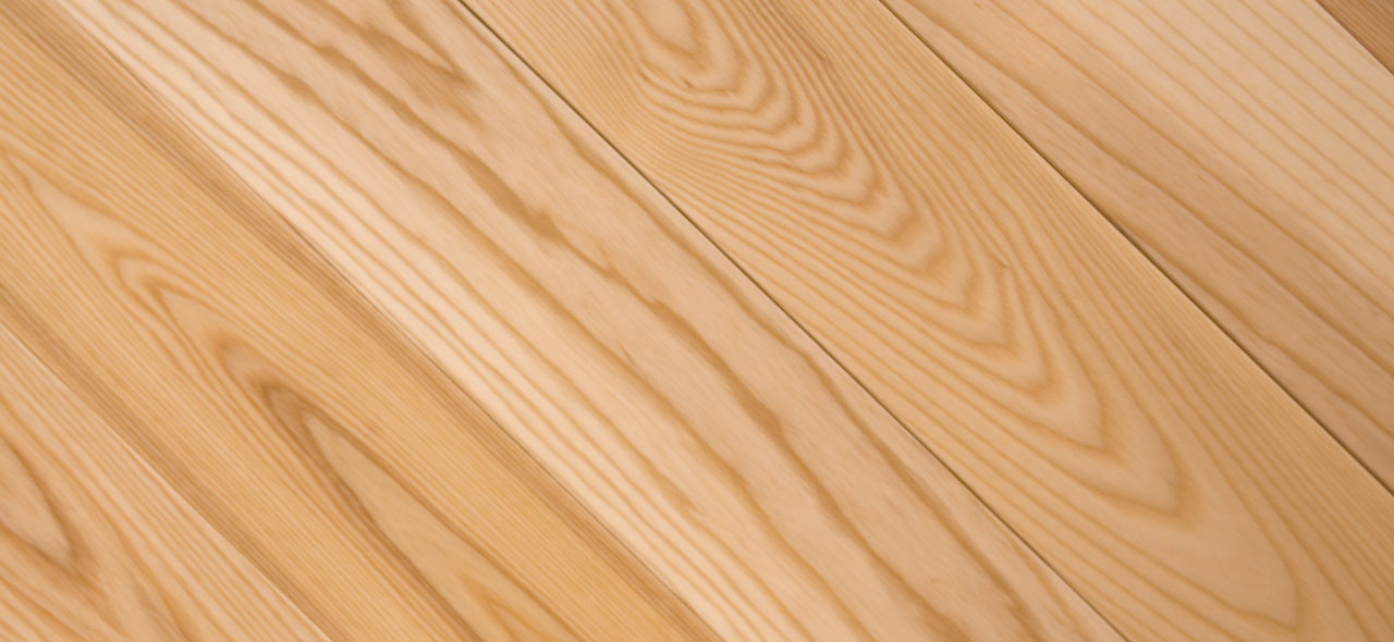 Ash hardwood flooring texture closeup. 
