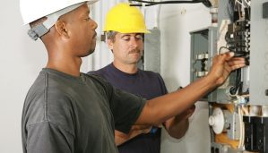 two men hired for electrical work