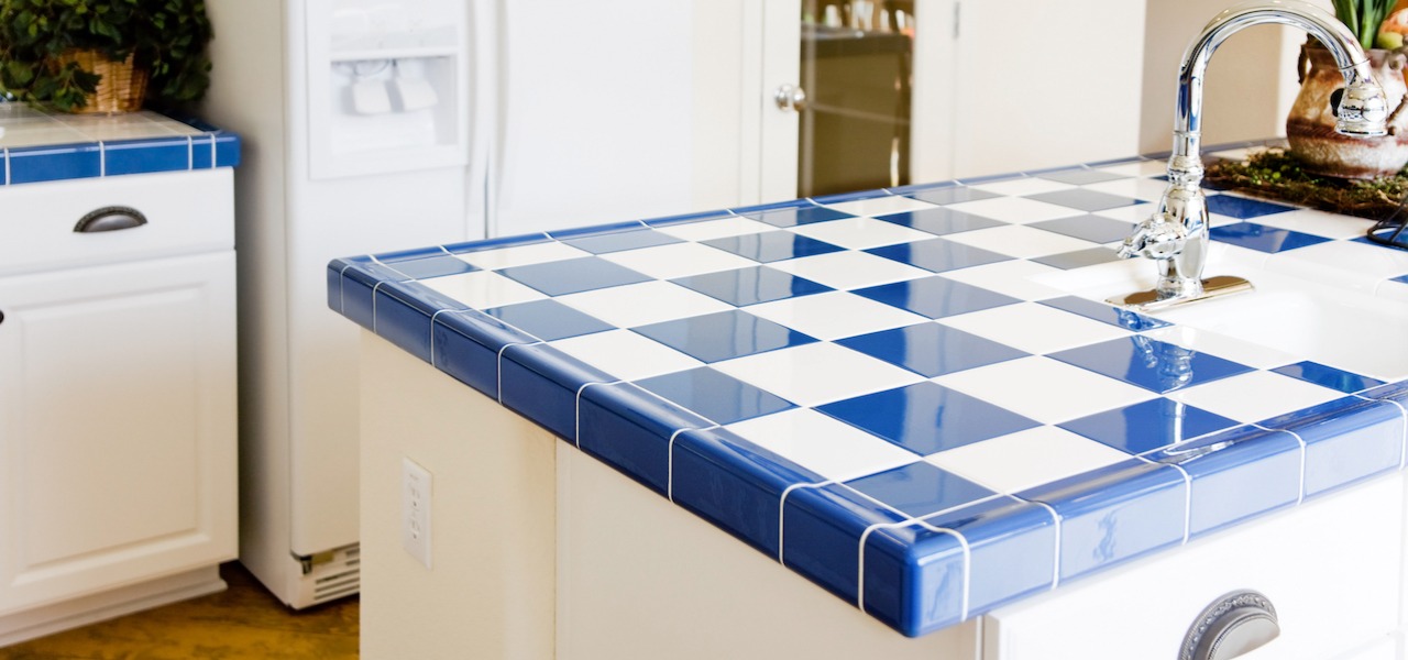 blue and white tile countertop in home