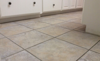 close-up of a tile floor being installed