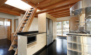 Kitchen with attic stairs