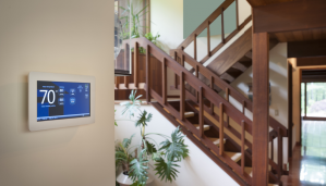 smart home thermostat on wall of seniors home