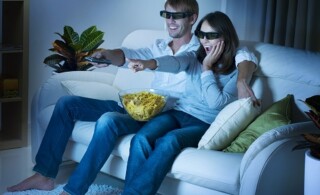 Couple watching movie at home
