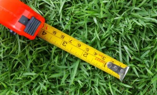 Finding lawn measurements with measuring tape