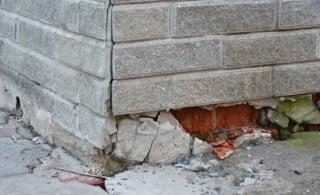 brick and concrete foundation needs repair