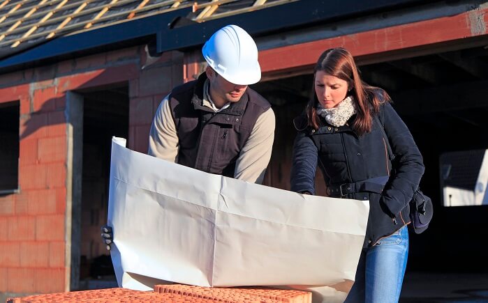 construction manager and woman at a home