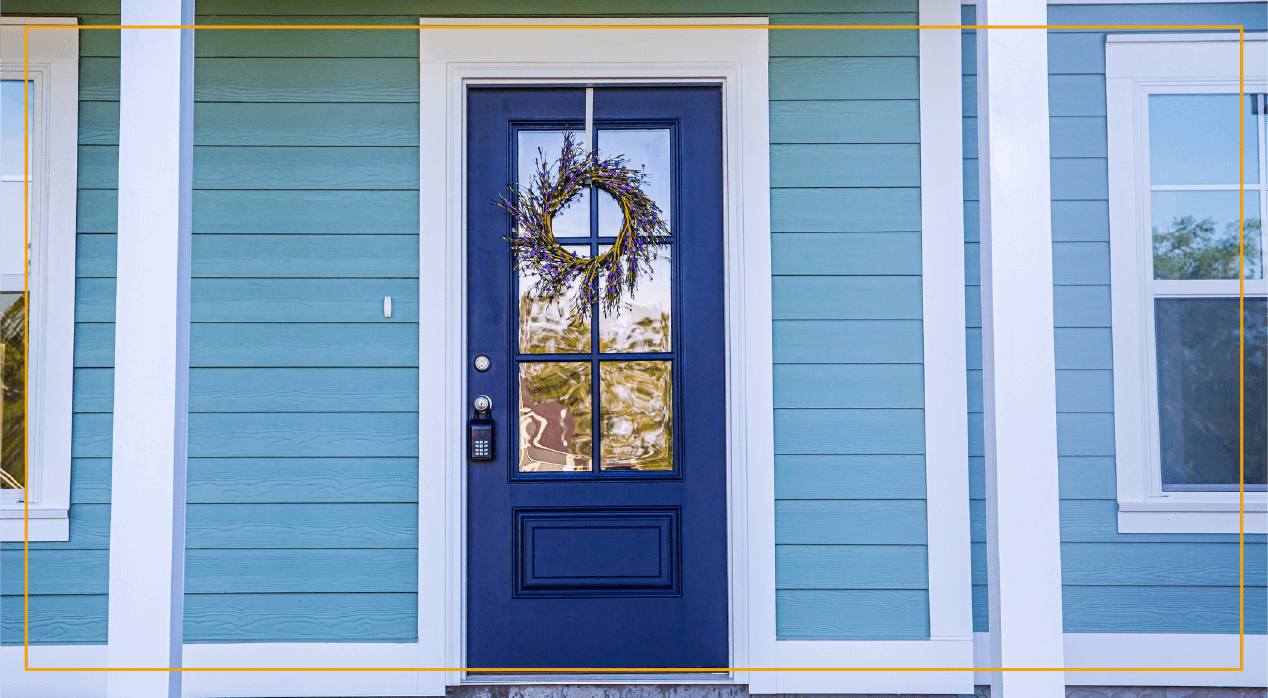 Blue door front of house