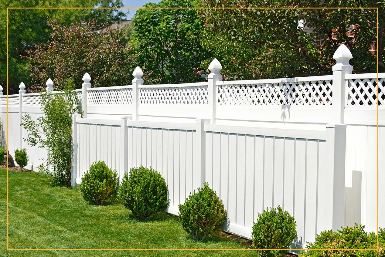 white composite fence in backyard