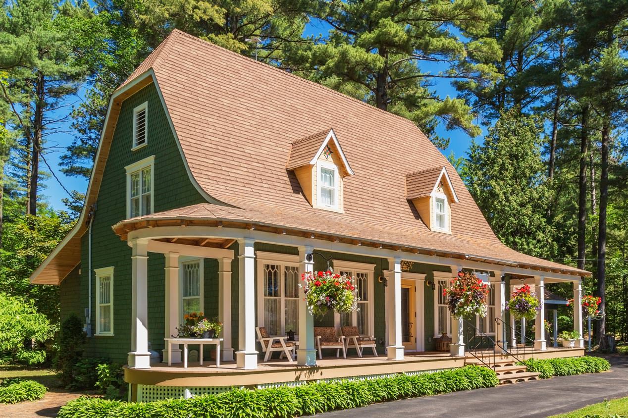 A beautiful 1920s house with cedar shingles in the roof