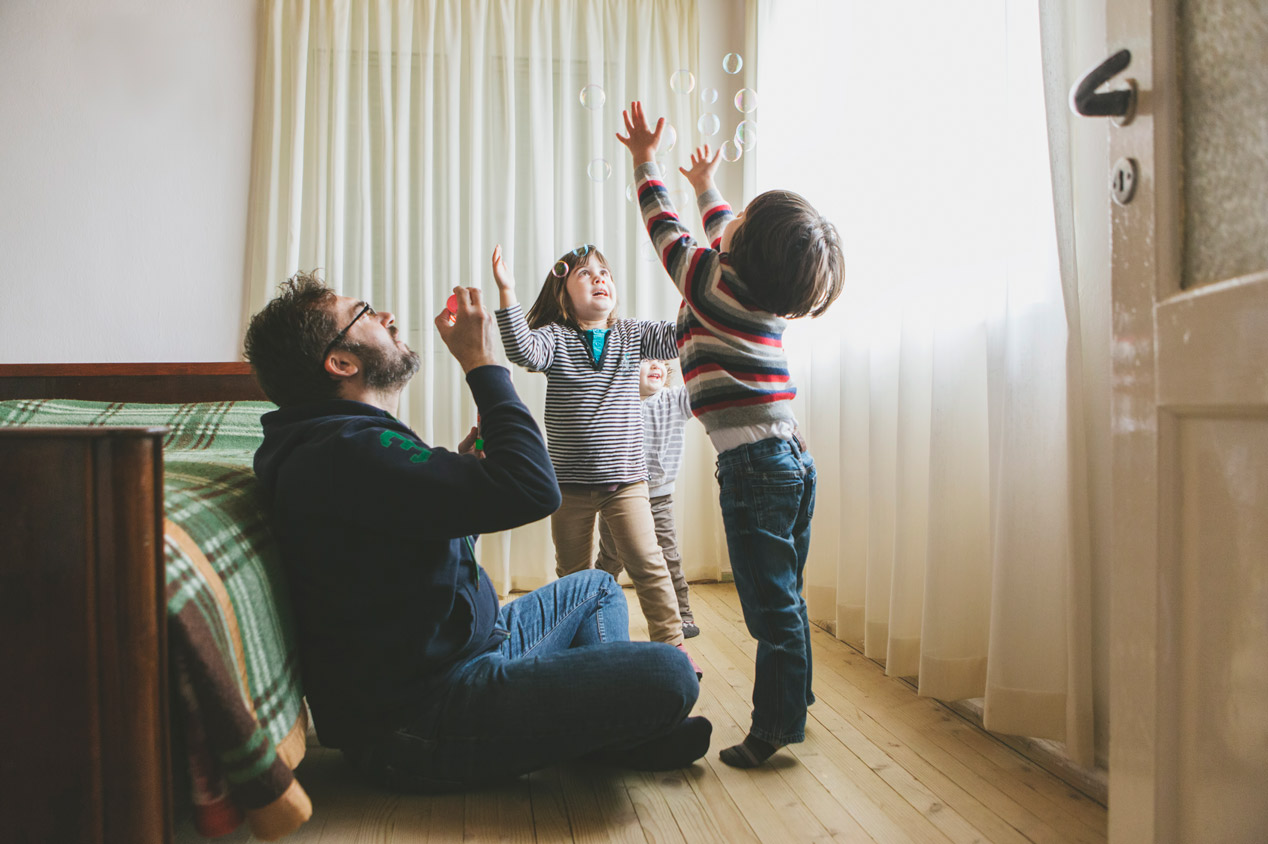 A man having fun with his children