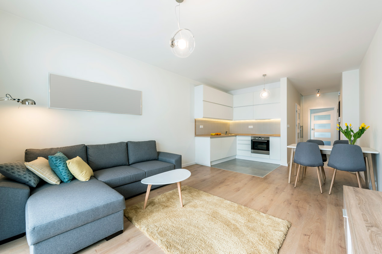 A modern living room with laminate floor