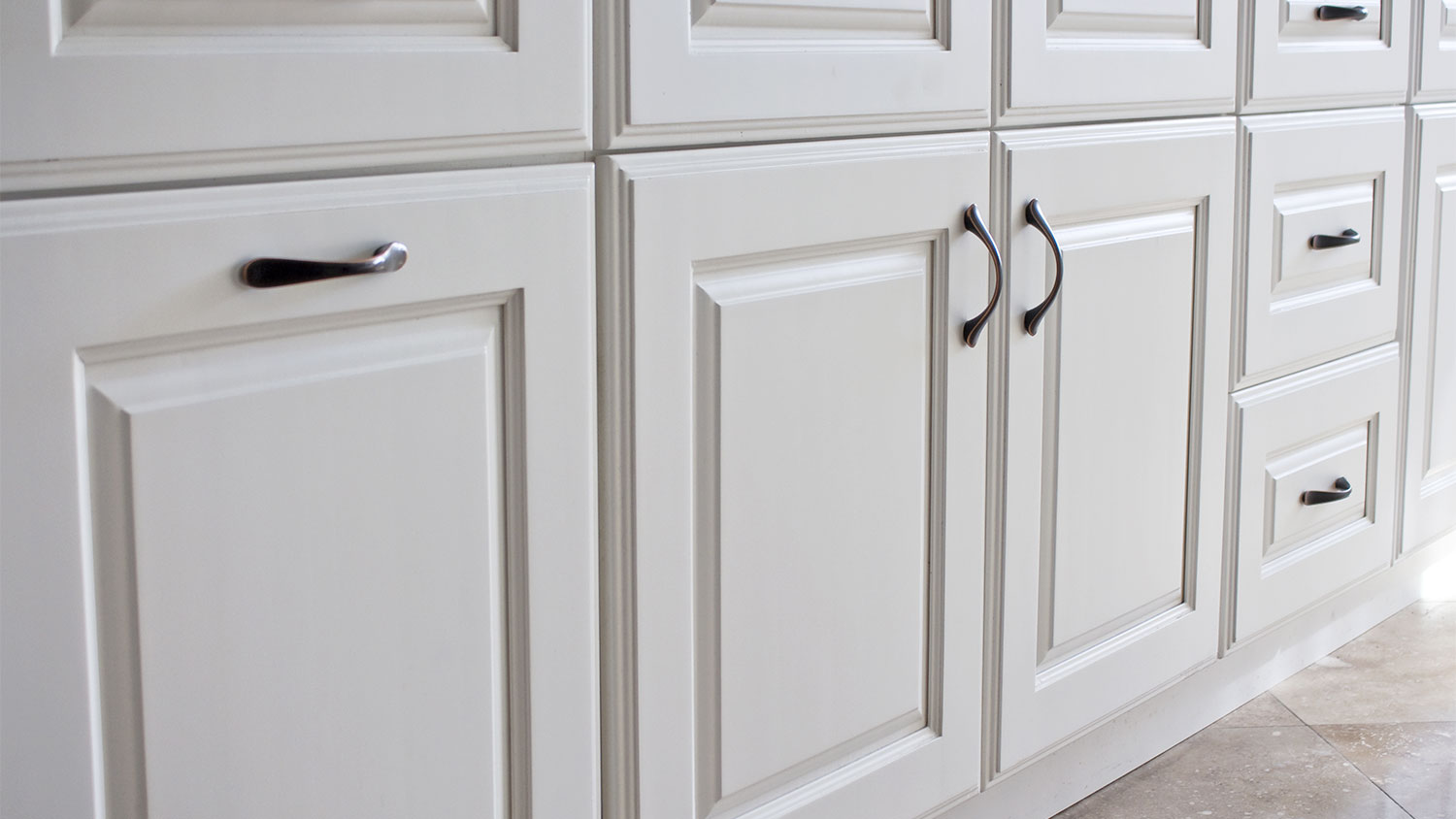 Detail of raised panel kitchen cabinets